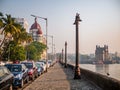 Cars parked near the promenade of Gateway of India and LuxuryÃÂ hotel Taj Royalty Free Stock Photo
